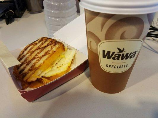 Egg white, bacon, & cheddar panini and latte