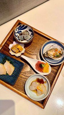 Live lobster sashimi Chopped toro with uni and caviar Oyster Jellyfish