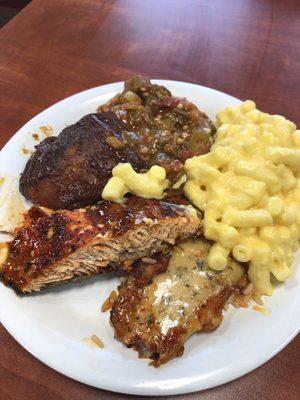 Bbq chicken, teriyaki salmon, and another fish. With macaronis and okra on the side.