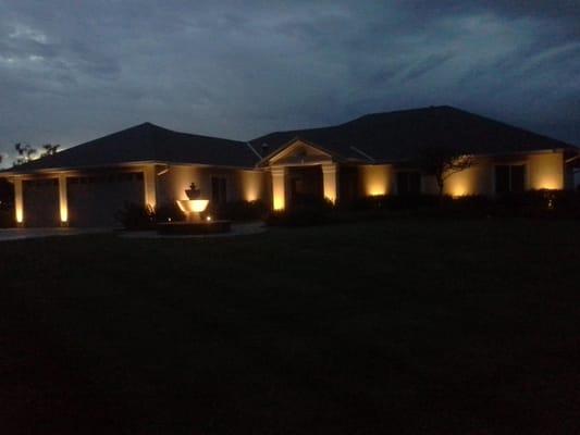 When we renovated this landscape we added in Kichler LED low voltage lighting to detail the landscape and house at night.