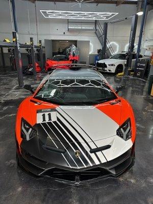 DDE's famous Aventador in for an emergency windshield replacement!