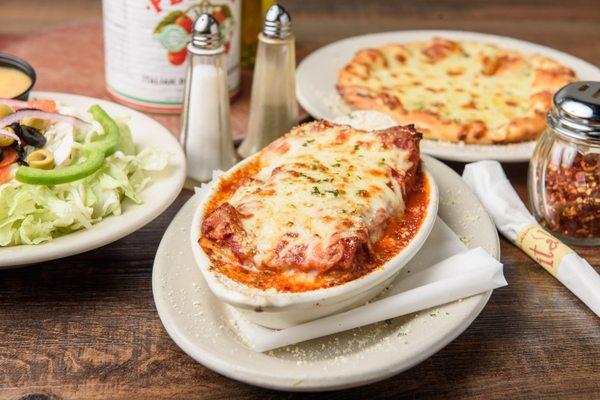 Lasagna Dinner served with choice of Salad & * Garlic pie