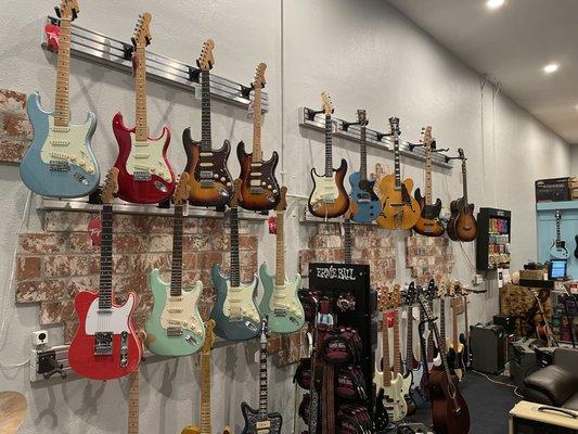 Many styles and brands of guitar and bass in stock, with orders coming in every day.  Let us help you find & play your new instrument.