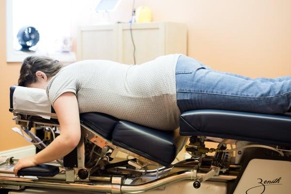 Pregnant women get to lay face down on our tables!