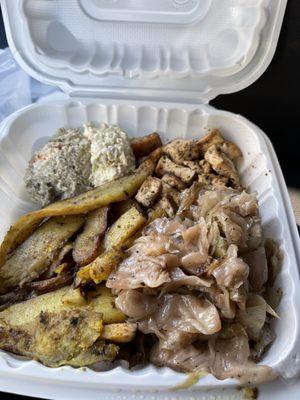 Multi items from the hot bar: cabbage, jerk tofu, tofu salad, potatoes, etc