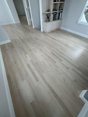 Maple floor refinishing, 3 coats of finish 
Finish: Bona HD traffic (satin)
Color: Bona seal Natural