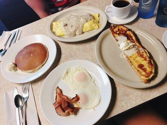 Country omelet & pancake, and French toast with 2 eggs and bacon. Best French toast I've had!