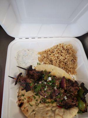 Lamb kebabs with homemade tzatziki and Greek rice