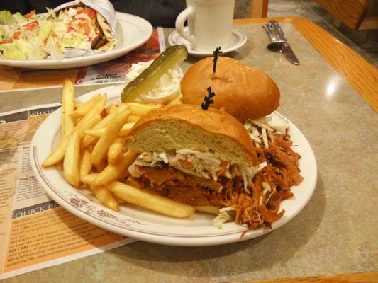 Smoked pulled pork and gyro in the background