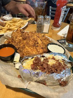 Chicken tenders and loaded baked potato