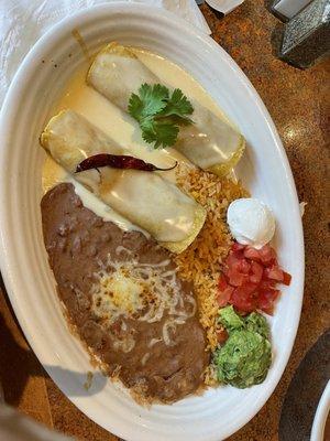 Pork enchiladas with cheese sauce simply delicious!