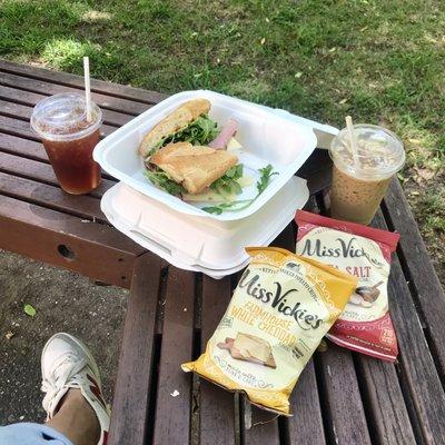 Ham sandwich; iced black tea; iced latte; complimentary Miss Vickies chips