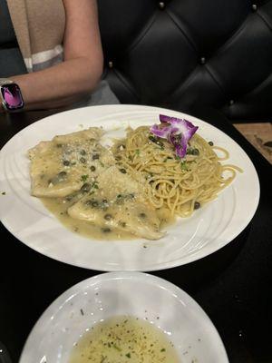 Chicken Piccata with spaghetti.