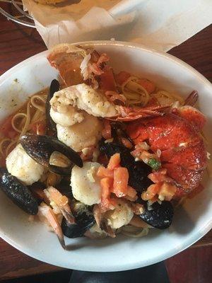 Bar Harbor lobster bake. On a bed of linguine. Baked in a garlic wine reduction. Very pleased