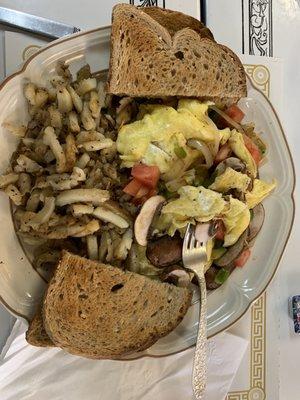 Garden veggies and eggs with has browns