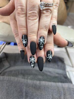 These nails are ready to stuff some stockings with coal.