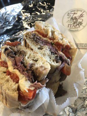 The Manhattan panini--roast beef,  Fresh mozzarella, roasted peppers, and horseradish sauce