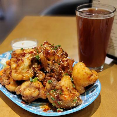 Asian chili-glazed cauliflower "wings" and Henhouse Saison beer