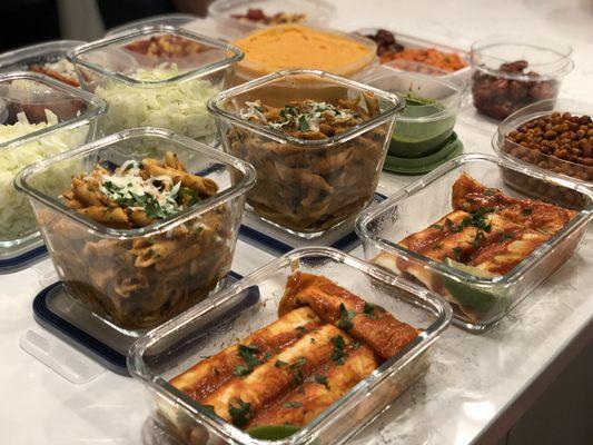 Weekly meal prep. Sweet potato enchiladas, pasta with Bolognese, herb roasted veggies.