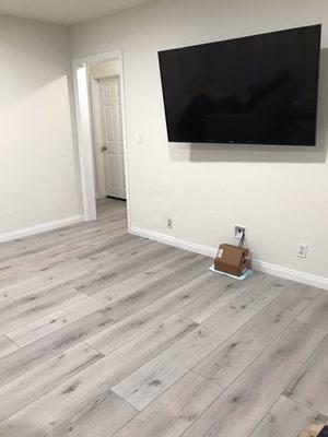 New vinyl flooring, baseboards, casings & paint