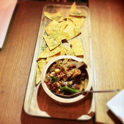 Eggplant kimchi (marinated Japanese eggplant, shiitakes, corn tortilla chips)