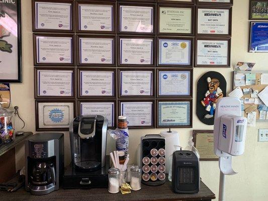 Coffee/hot water for tea available under the wall of certifications