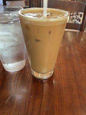 Iced latte (grounds in the drink, tasted bitter and watered down) not worth the $6.