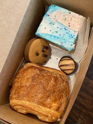 Macaron, peanut butter buckeye, cotton candy brownie, & pain au chocolat