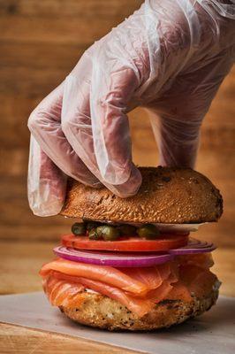 CLASSIC NY BAGEL & LOX SANDWICHES (smoked  salmon, cream cheese, tomato, onion and Caper) on Bagel