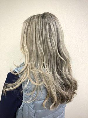 Blonde highlights to create lightness around the face and blend the white or grey "sparkles" into a more even tone. @HairfunwithRachel