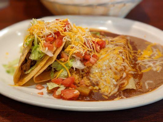 Shredded beef tacos and enchilada