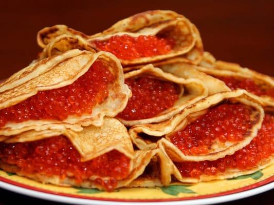 Our all-time favorite: blintzes with caviar