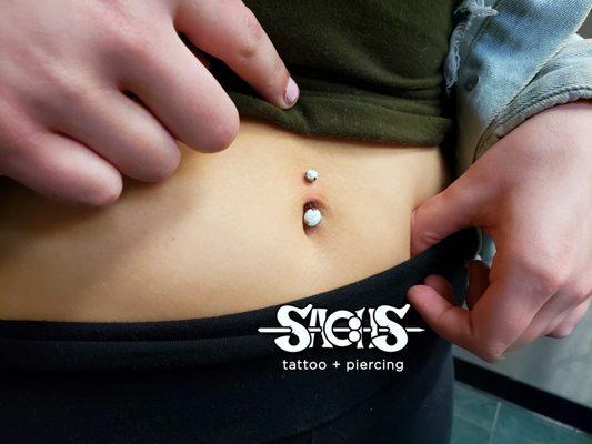 Firey white opal navel piercing by Callen G.