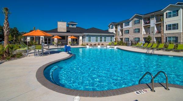 Relax on the pool deck or take a dive into the sparkling swimming pool this summer