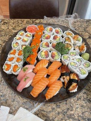 Custom platter of rolls and sushi