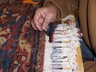 Expert musuem quality rug repairs and re-weaving. Edge repairs, Binding, Serging and Re-Fringing 