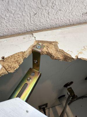 Brackets for Undermount sink attached to severely damaged particleboard.