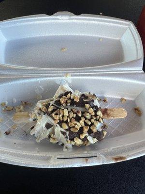 Masapan flavored ice cream bar covered with chocolate and peanuts