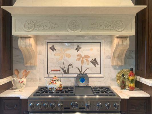 Custom waterjet backsplash tile. Designed, cut and installed per customer requirements.,