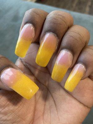 Other hand with my mix and match nails different sizes and all only one is ombré and the rest look like pink and yellow French tips ‍