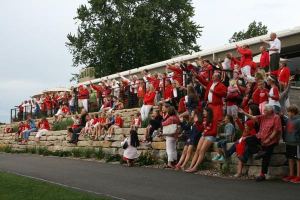 Members enjoying our annual BIG RED party!