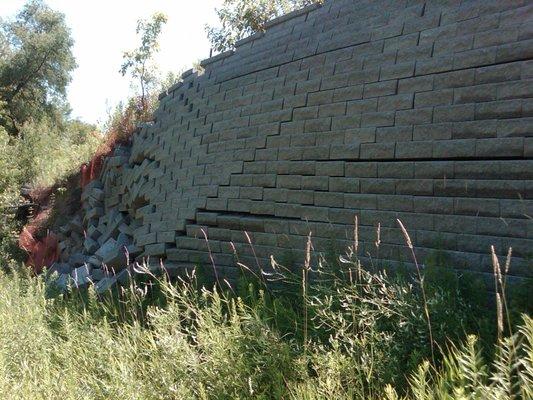 Failed segmental retaining wall.