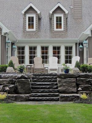 All natural stone retaining wall with steps