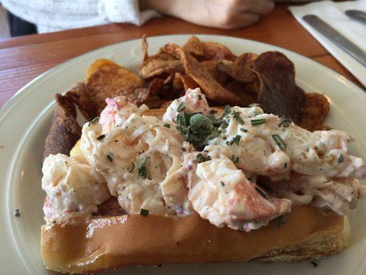 Lobster roll with a side of chips