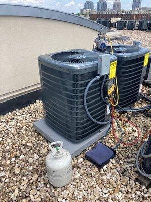 New Installation of two Goodman 2.5 ton heat pump spilt systems roof top units.