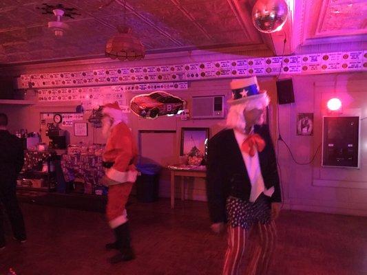 Santa and Uncle Sam tearin' it up at the Halloween Party