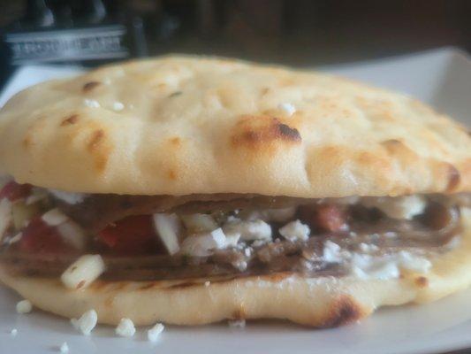 Gyro-meat sandwich on naan with feta, tzatziki (from Giant), homemade greek pica de gallo (use lemon instead of lime juice)