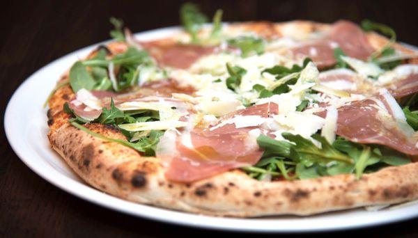 Pizza Kesté: tomato sauce, imported buffalo mozzarella, arugula, prosciutto di Parma, shaved pecorino