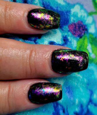 Chameleon colors over black gel polish.