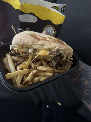 Cheesesteak and fries